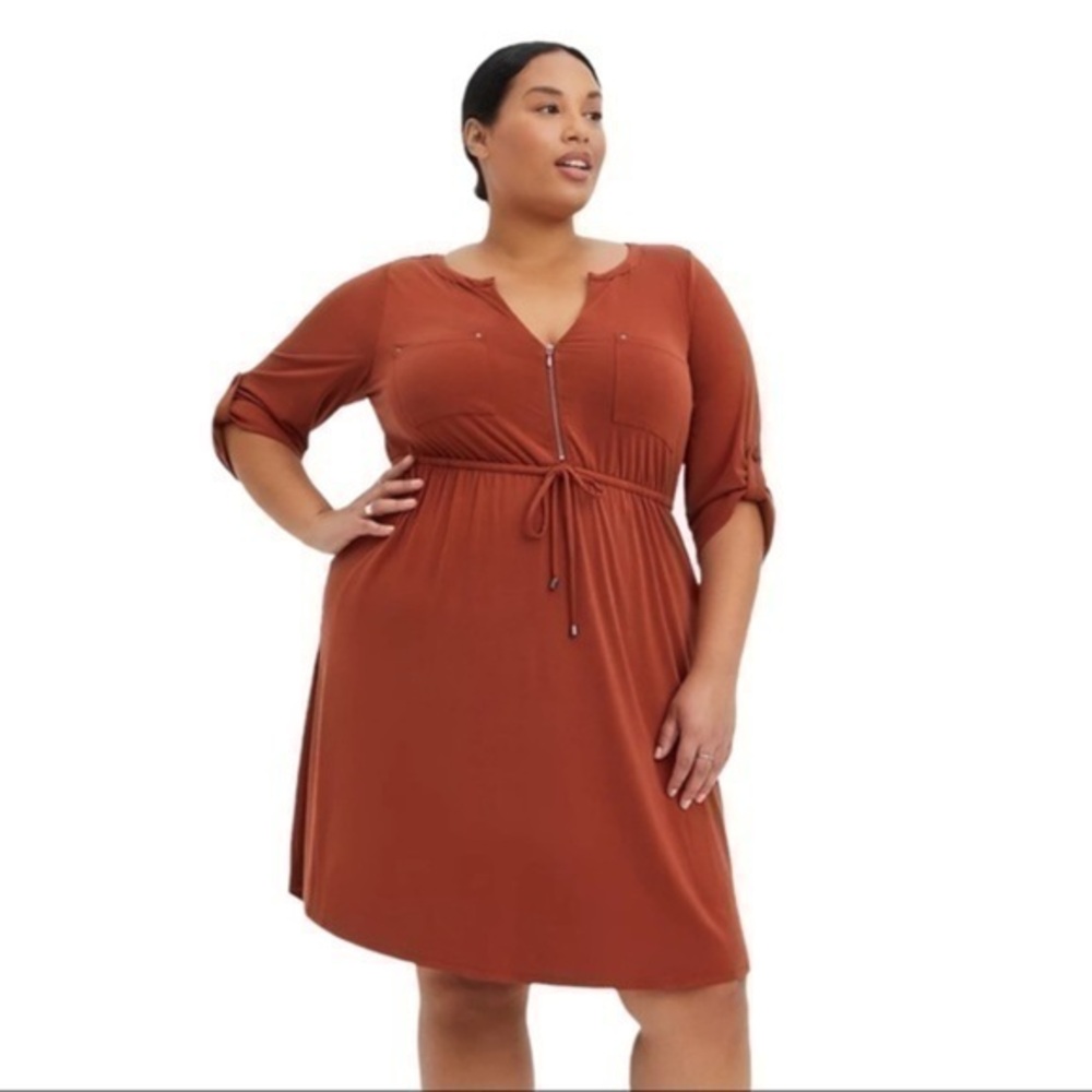 Torrid rust colored zip front flowy tie waist button
sleeve solid dress